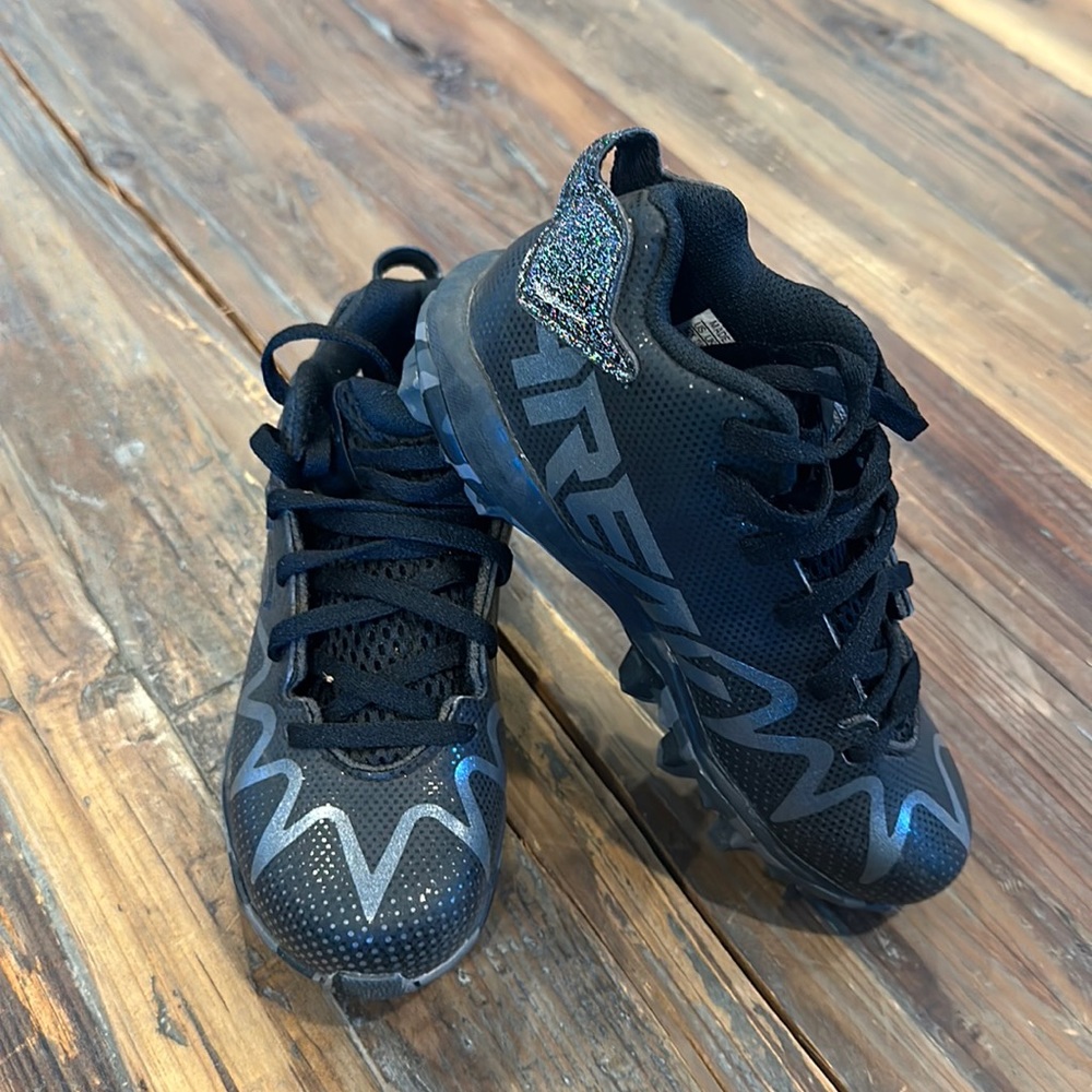 Boy’s Adidas football cleats.